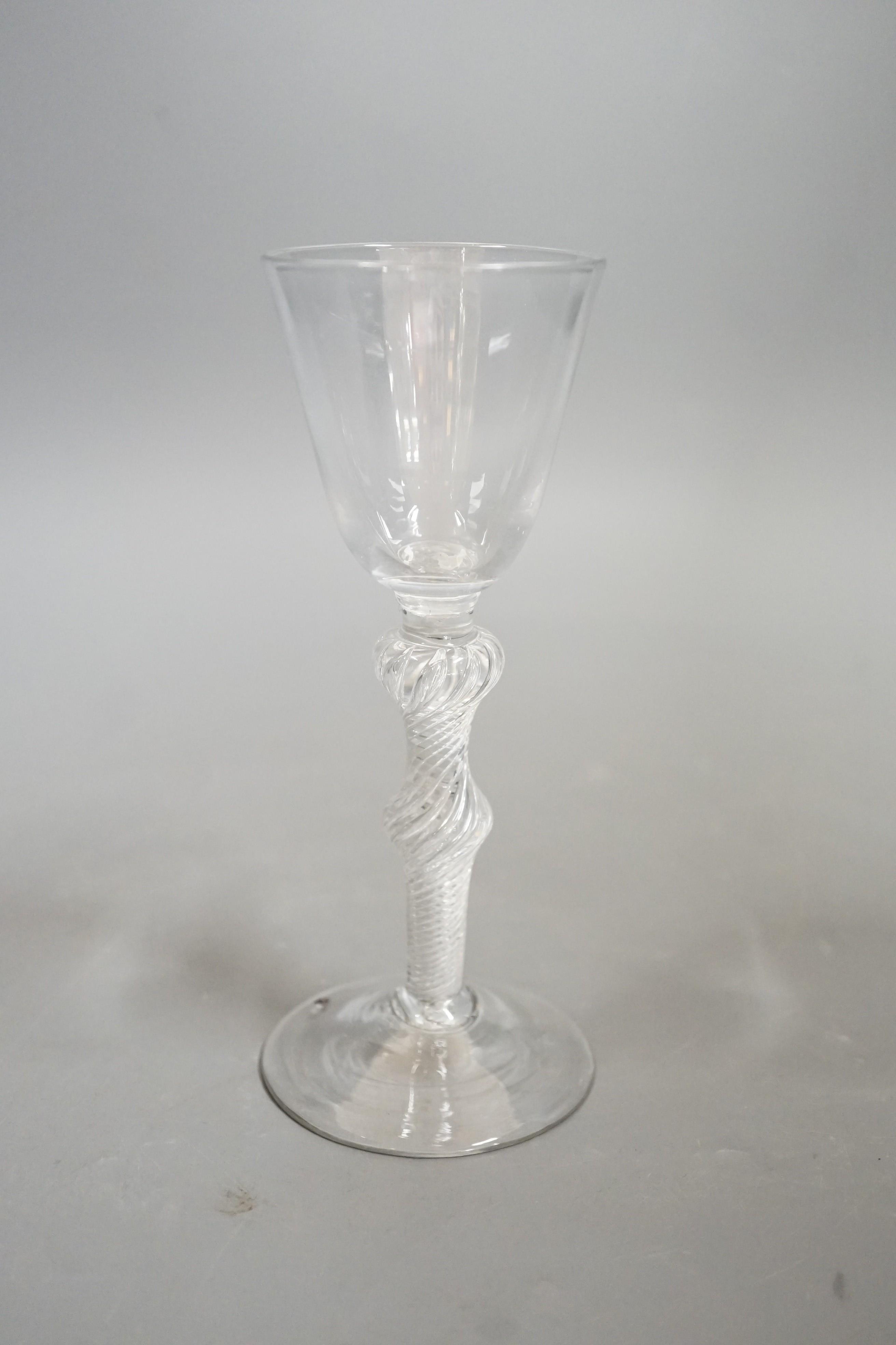 A mid 18th century double knop airtwist wine glass, 16cms high